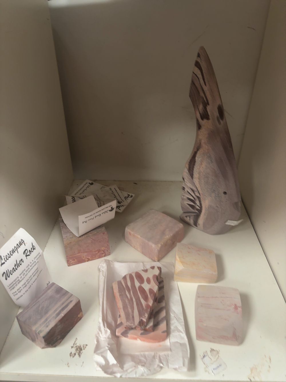 Lot 319: A Collection of Liesegang Weather Rock Siltstone Specimens including a Carved Figure