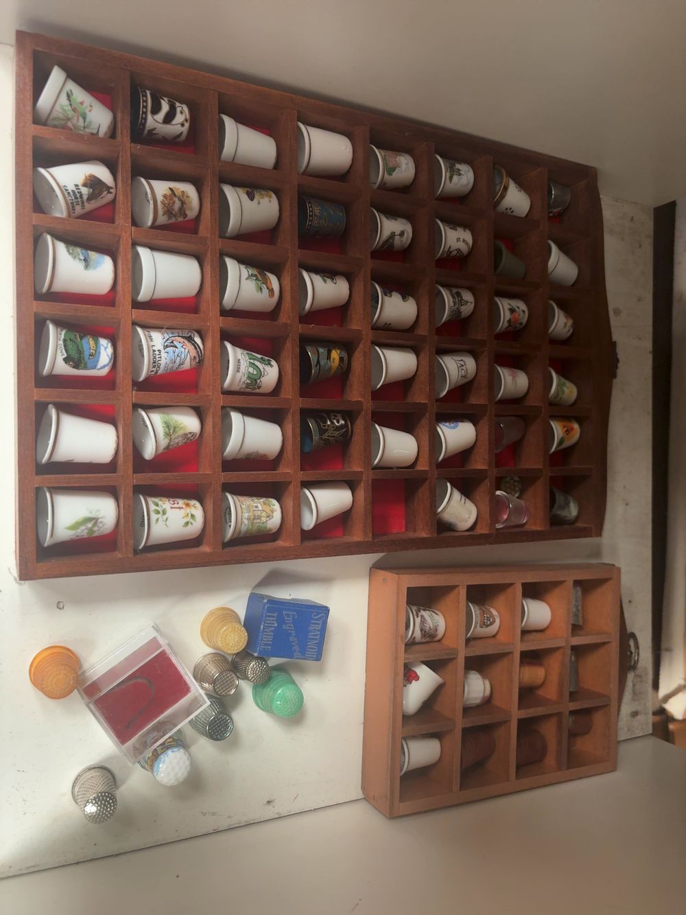 Lot 320: A Collection of Mixed Souvenir and Decorative Thimbles with Two Wooden Display Cases