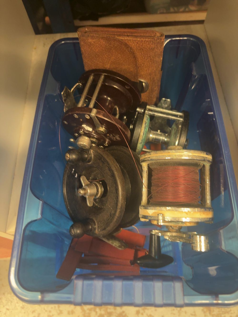 Lot 324: A Collection of Vintage Fishing Reels and Angling Accessories