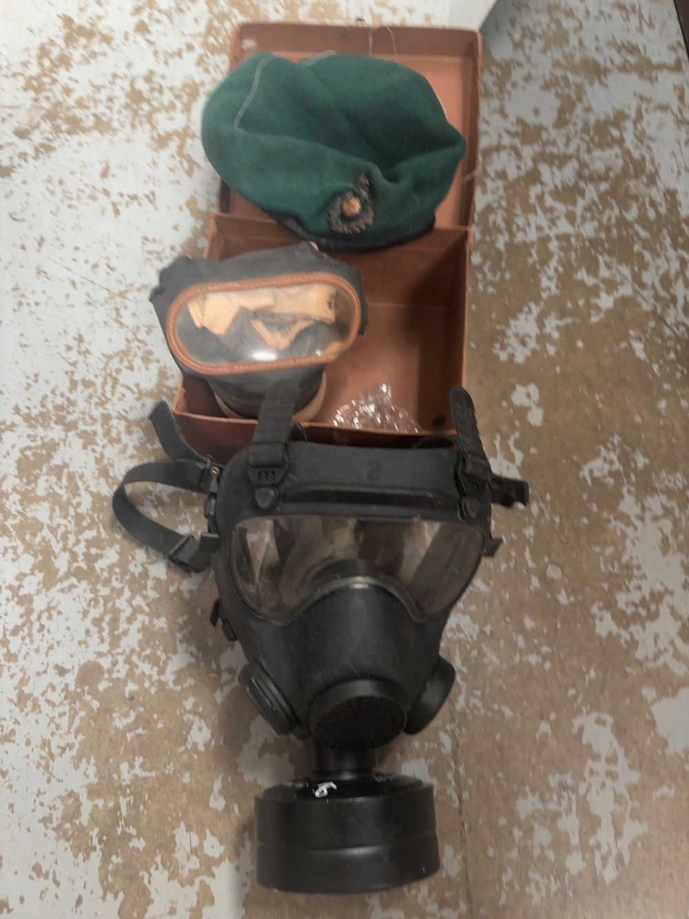 Lot 327: A Trio of British Military Accoutrements comprising a Royal Marines Commando Beret and Two Respirators