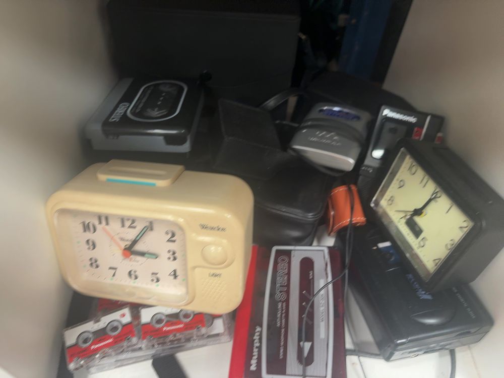 Lot 329: A Collection of Vintage Portable Audio Electronics and Analogue Alarm Clocks