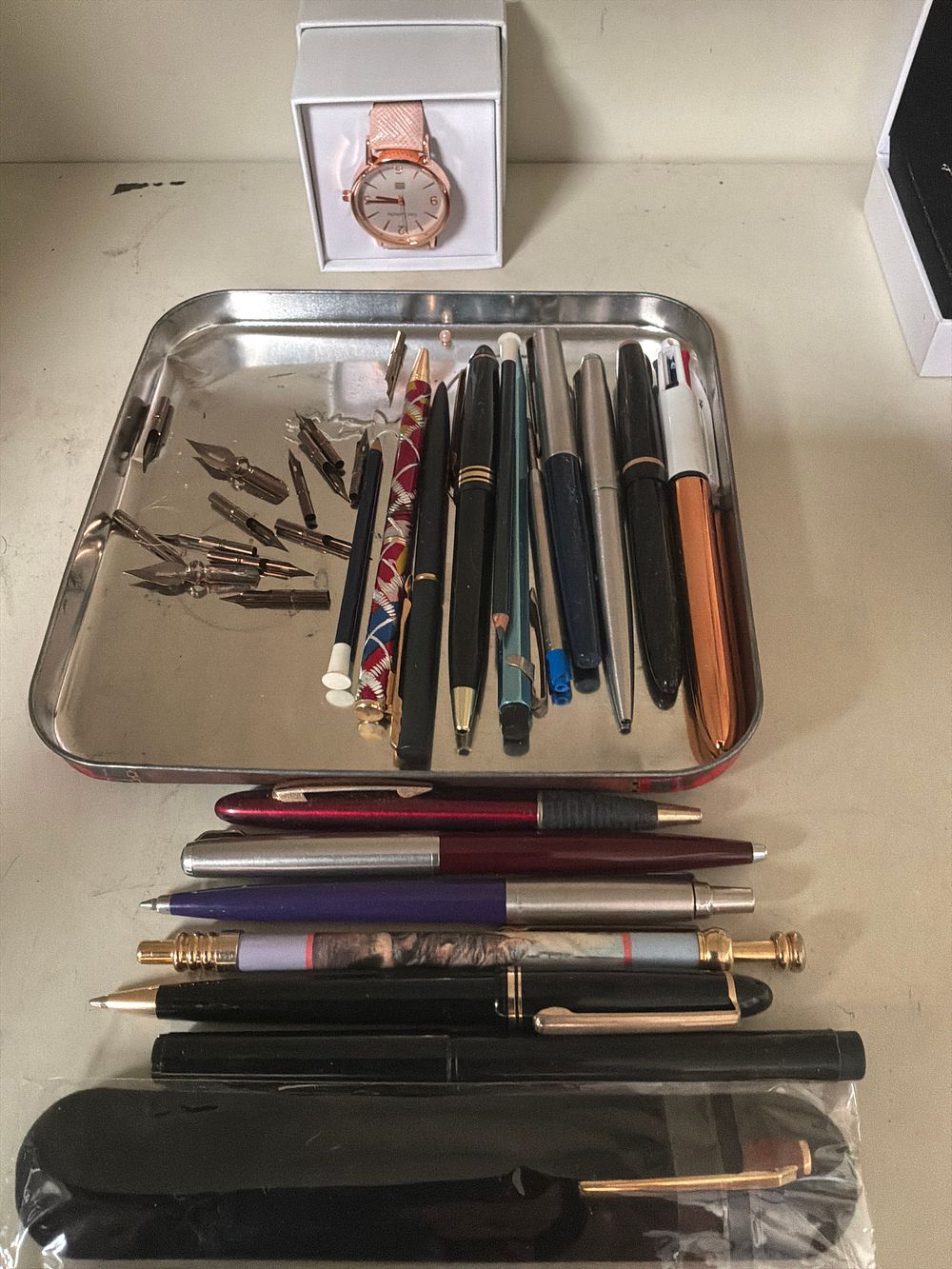Lot 355: A Collection of Writing Instruments and a Lady's Guy Laroche Wristwatch