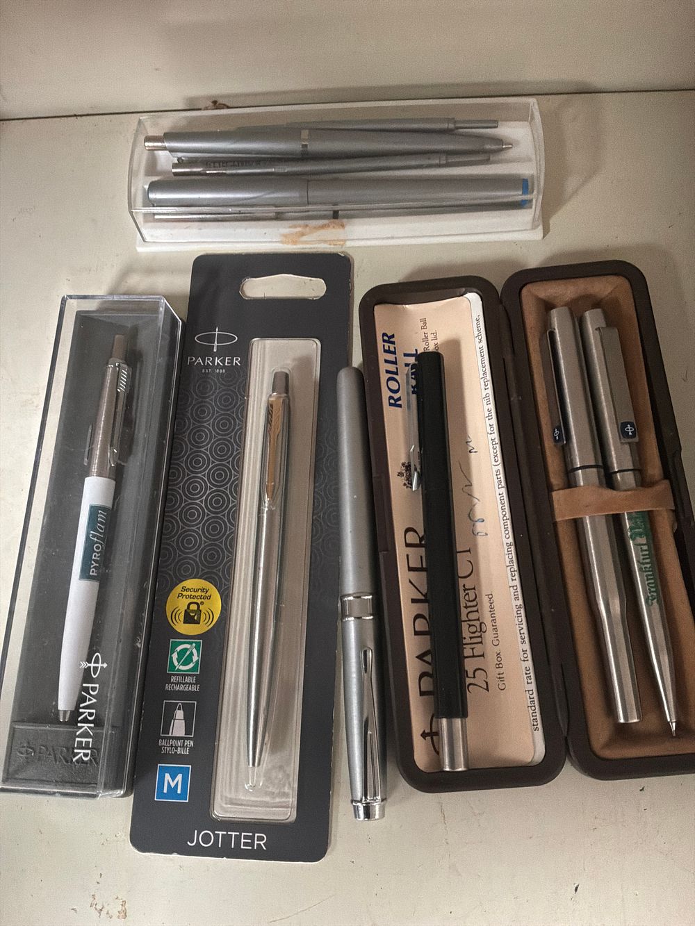 Lot 358: An Assortment of Parker Writing Instruments including Jotter, 25, and 45 Flighter Models