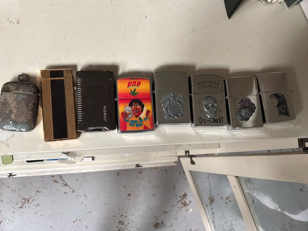 Lot 360: A Collection of Vintage and Modern Lighters including Lundi, Jobon, and Zippo-Style Examples