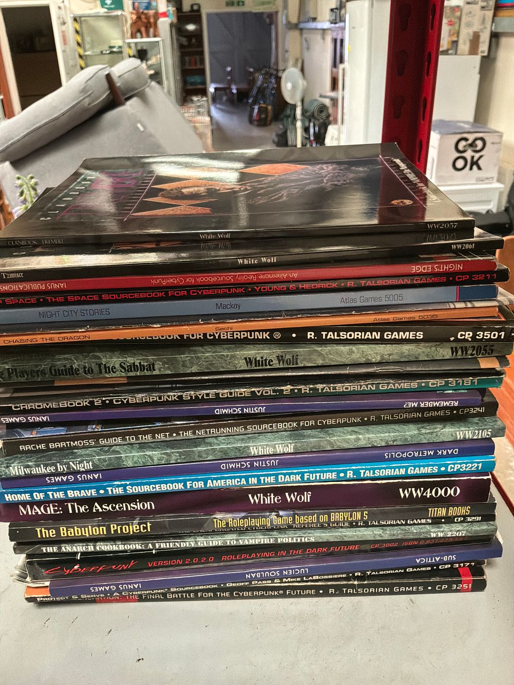 Lot 370: A Collection of Vintage Tabletop Role-Playing Game Sourcebooks and Modules by R. Talsorian Games, White Wolf Publishing, and Others