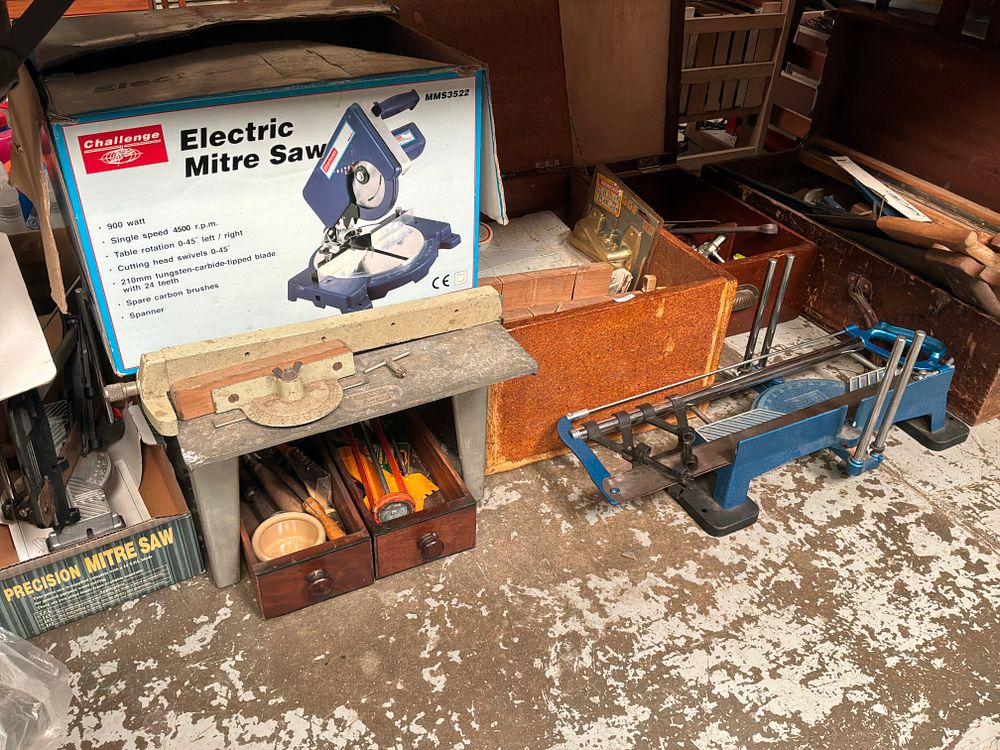Lot 378: A Collection of Woodworking and Workshop Tools featuring a Challenge Electric Mitre Saw and Hand Tools
