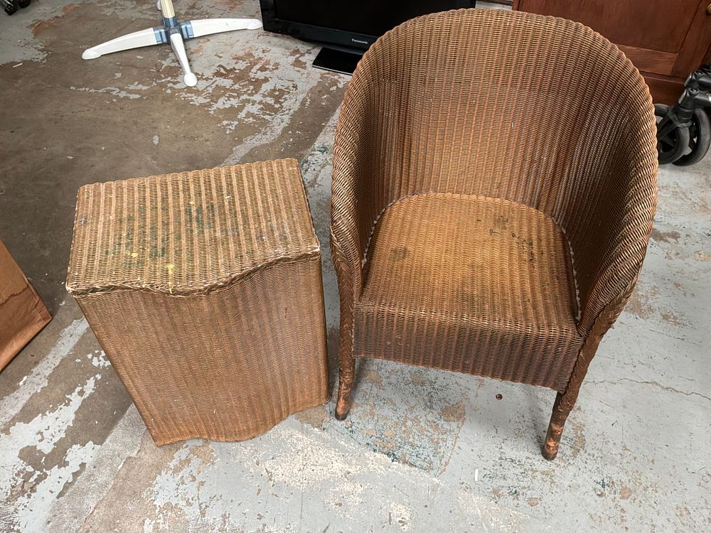 Lot 383: A Lloyd Loom Tub Chair and Matching Bow-Front Linen Basket by Lusty and Sons Ltd
