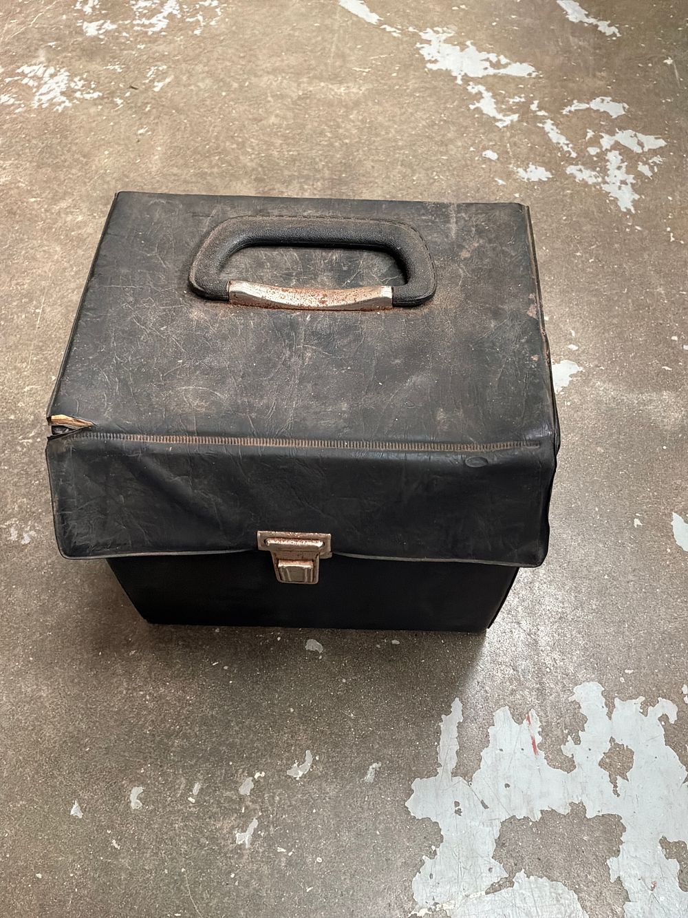 Lot 392: A Collection of Seven-Inch Vinyl 45 RPM Singles Housed in a Vintage Carrying Case