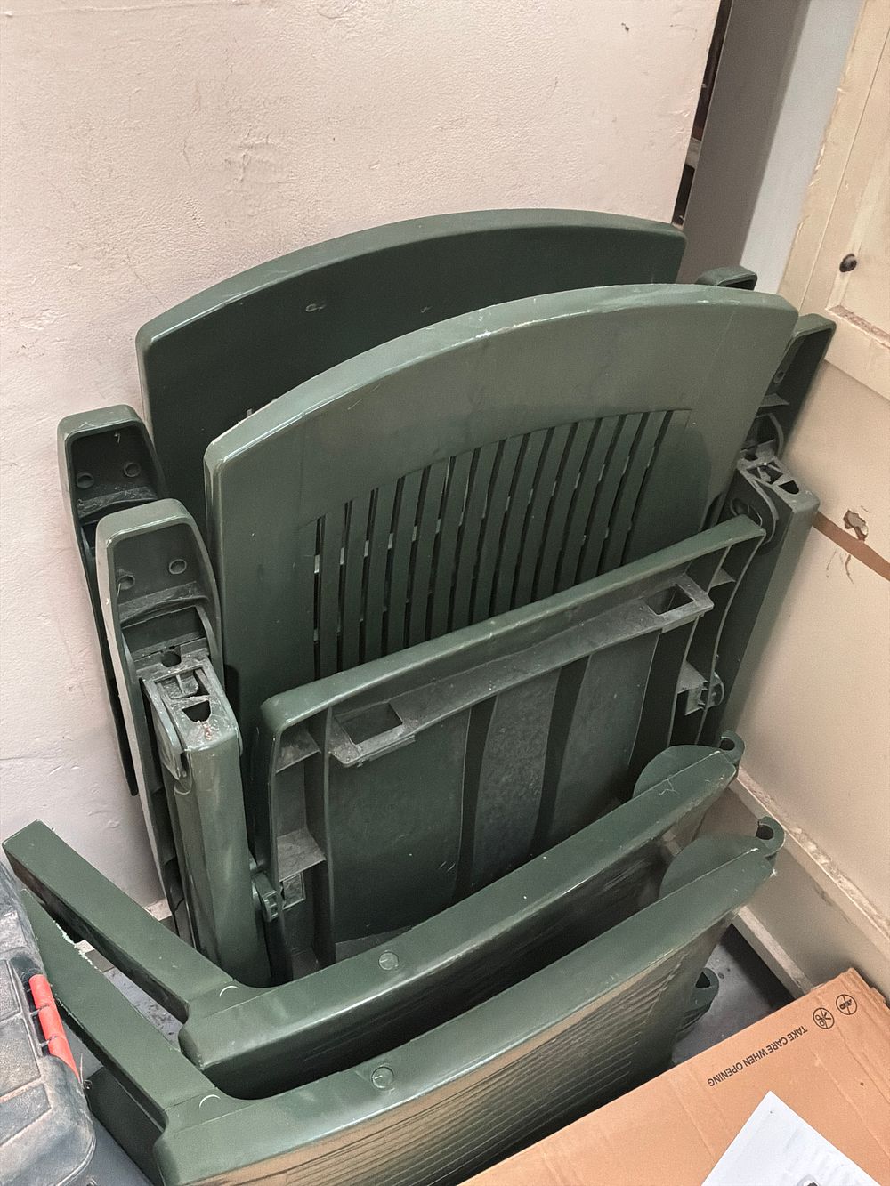 Lot 402: A Pair of Green Moulded Plastic Folding Garden Recliner Chairs