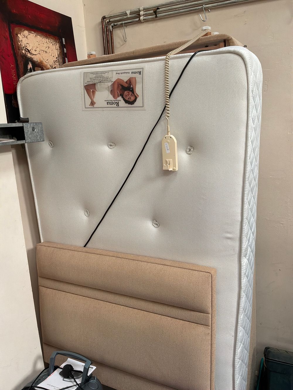 Lot 405: An Electric Adjustable Single Divan Bed Base with a Roma Orthopaedic Mattress and Matching Headboard