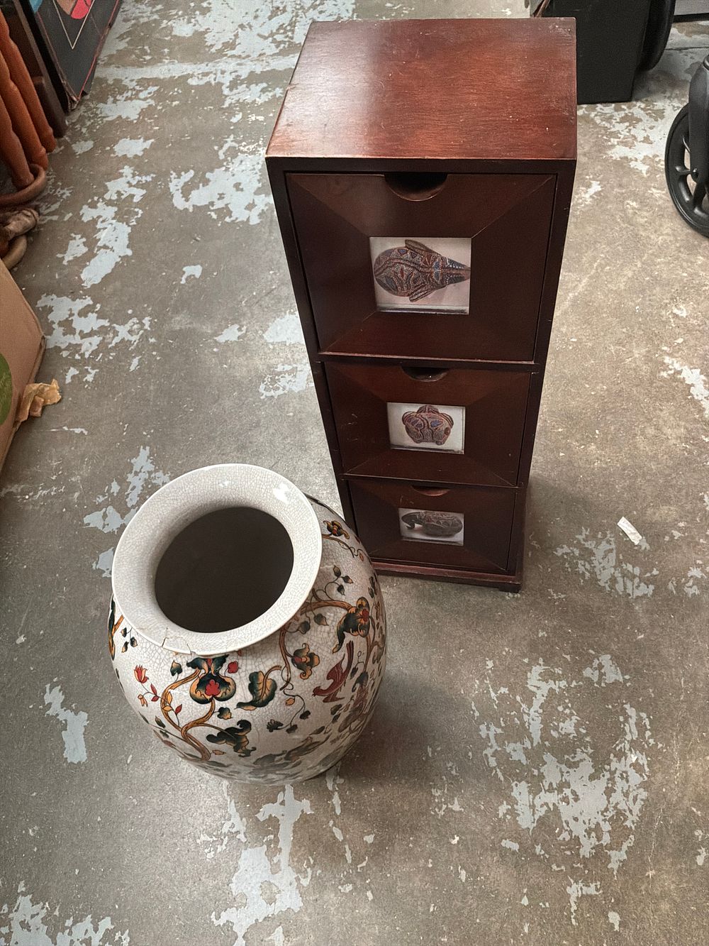 Lot 416: Two items comprising a small dark wood three-drawer chest and a large polychrome ceramic vase