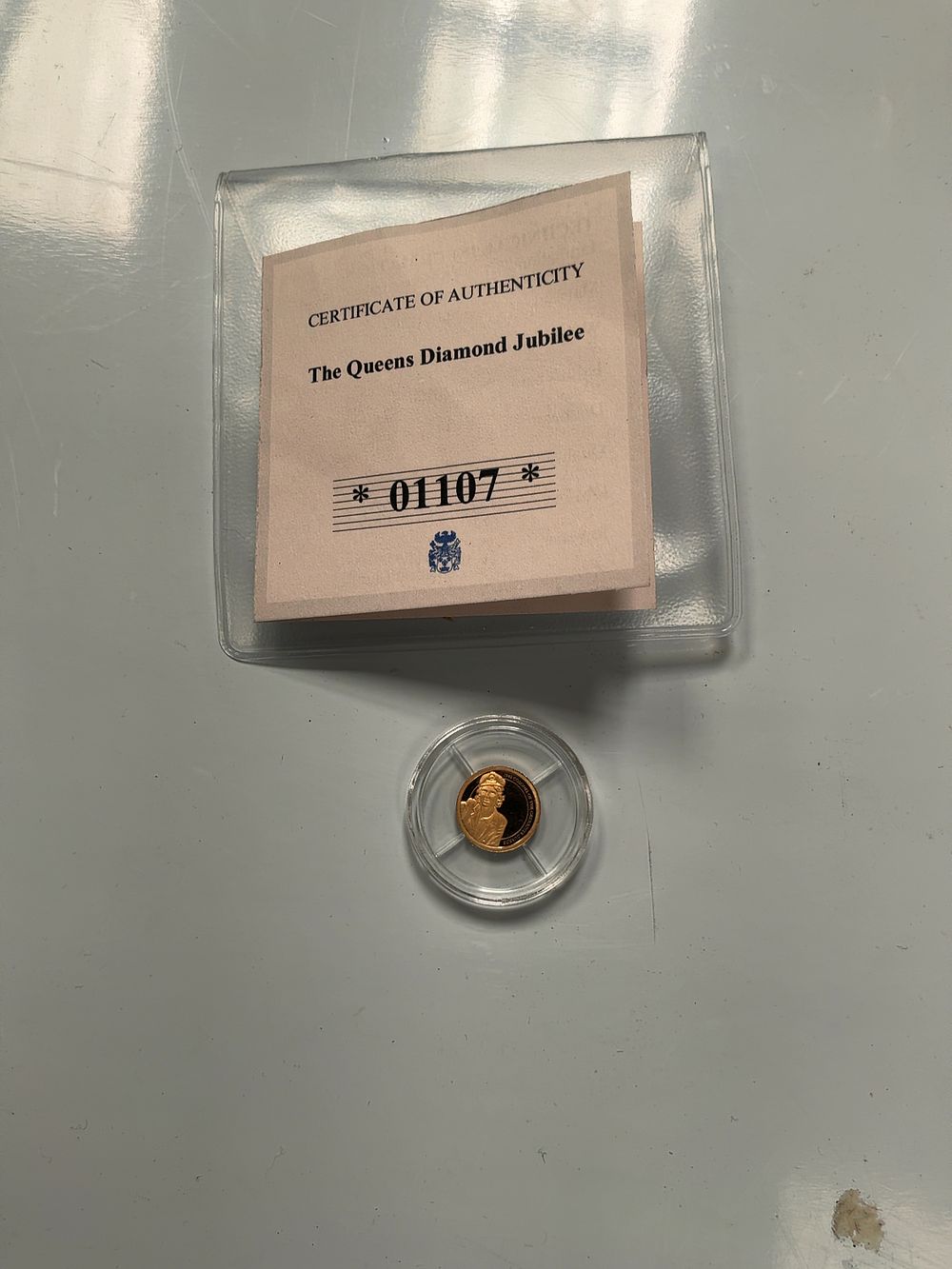 Lot 116: UK 2012 Queen Elizabeth II Diamond Jubilee 14 Carat Gold Proof Commemorative Strike