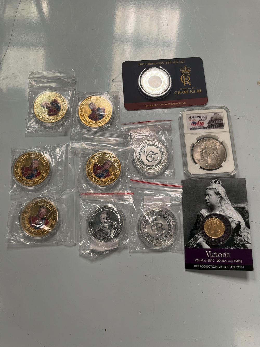 Lot 124: A Group of British Royal Commemorative Medals and a US 1885 Morgan Silver Dollar