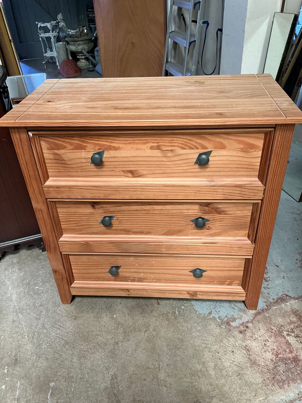 Lot 458: A contemporary Mexican style solid pine chest of three drawers