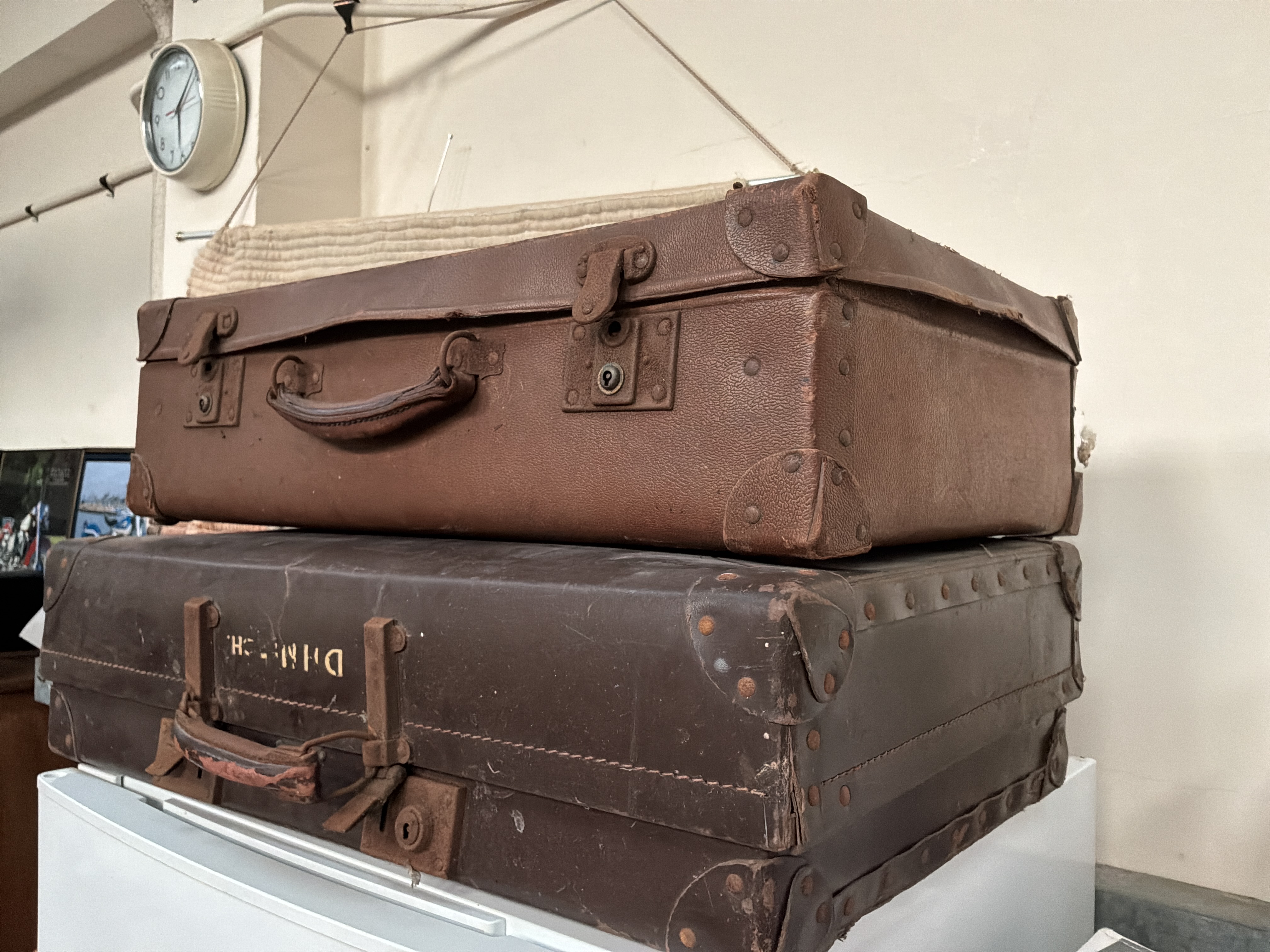 A Pair of Mid-20th Century British Travel Suitcases by Hempite and Revelation