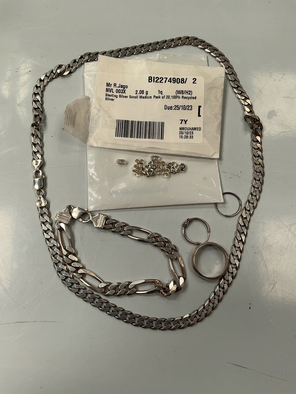 Lot 79: A Collection of Sterling Silver Jewellery including Curb and Figaro Link Chains