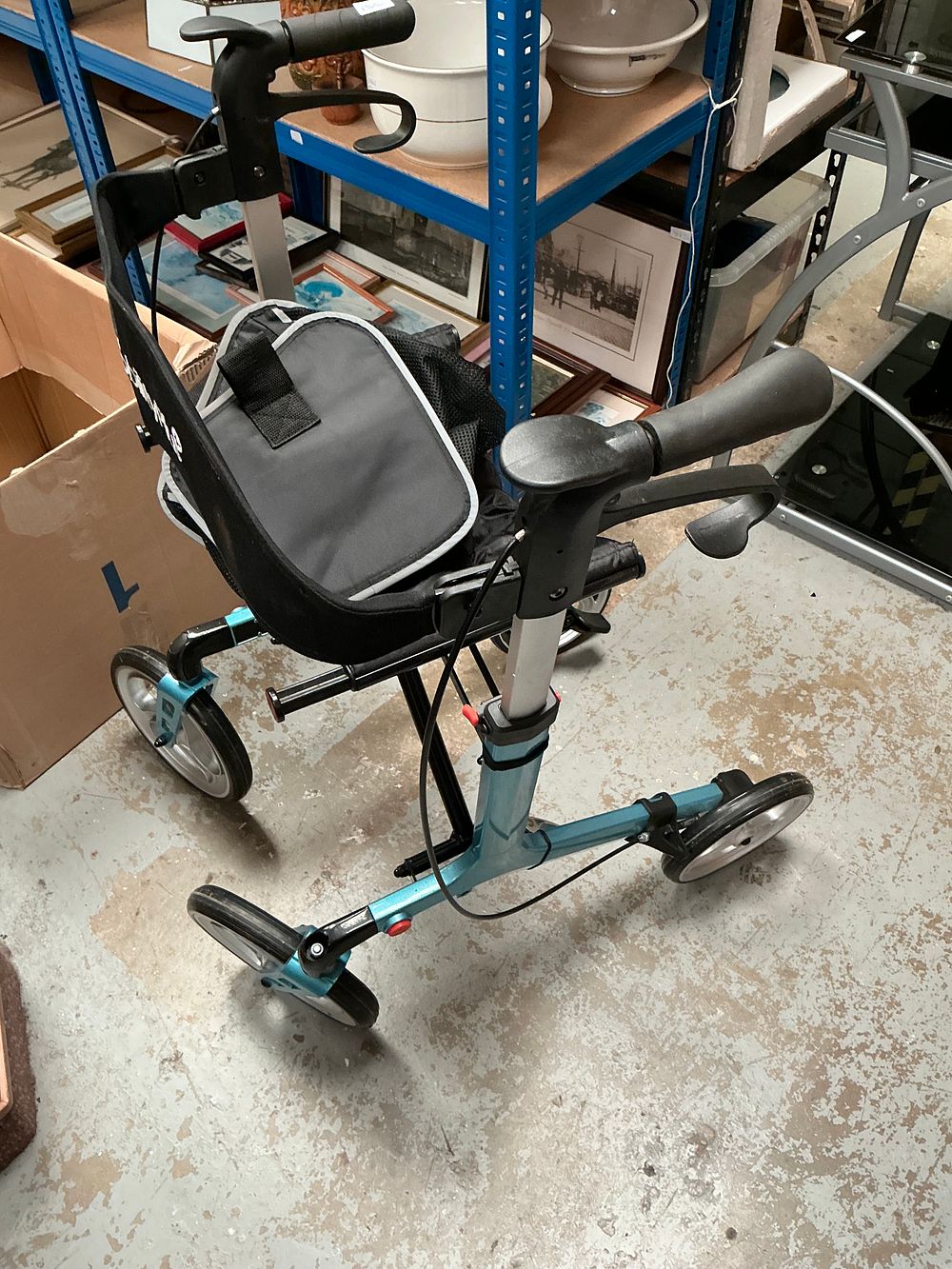 Lot 154: A MobilityPlus+ Teal Four-Wheeled Folding Rollator Mobility Walker