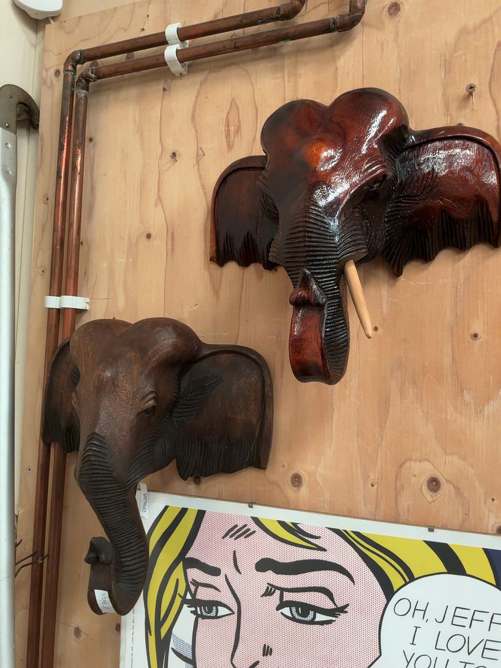 Lot 163: Two Thai Carved Hardwood Elephant Head Wall Plaques