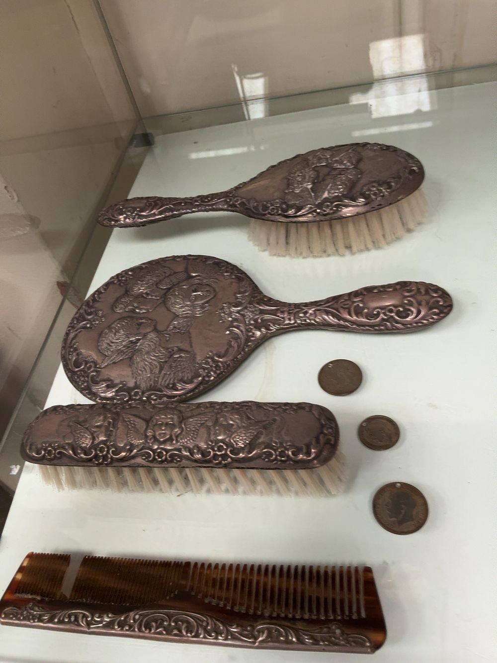 Lot 168: A Set of Sterling Silver and Faux Tortoiseshell Dressing Table Accessories in the Reynolds Angels Pattern