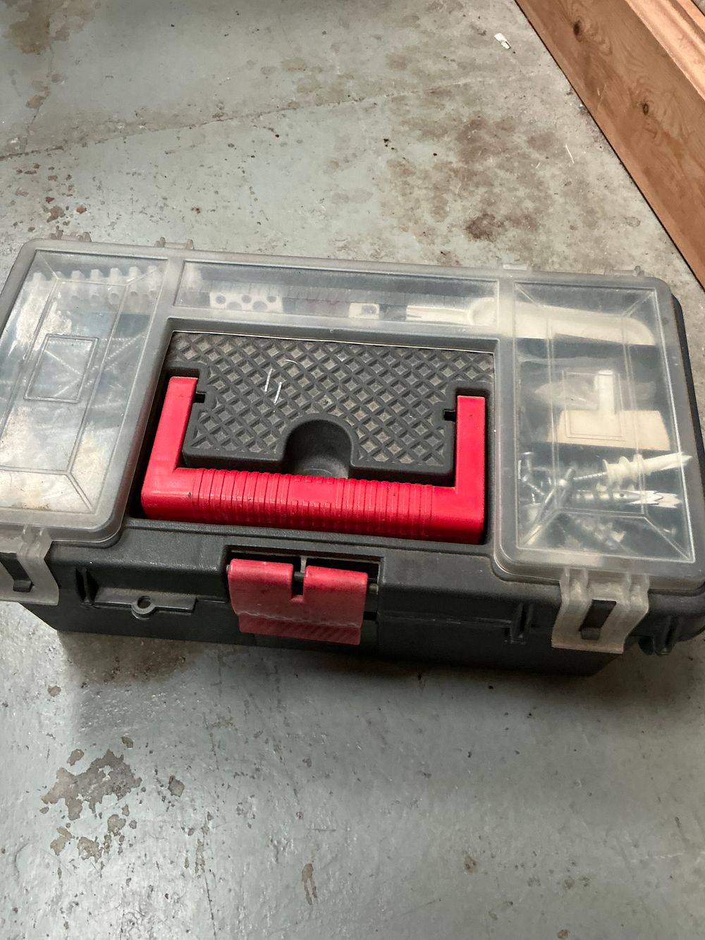 Lot 180: A Portable Plastic Toolbox with an Assortment of Hand Tools and Hardware