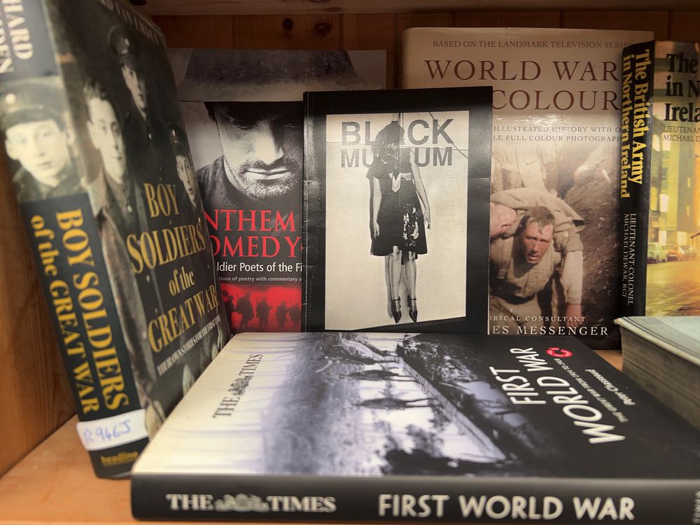 Lot 183: A Collection of Books including First World War History, Biographies, and Reference Volumes (DJ)