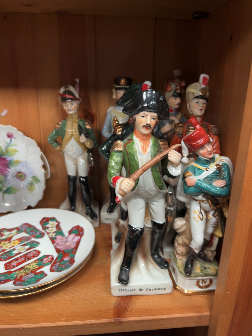 Lot 194: An Assortment of Porcelain Napoleonic Military Figurines, Cut Crystal Glassware, and Decorative Sundries