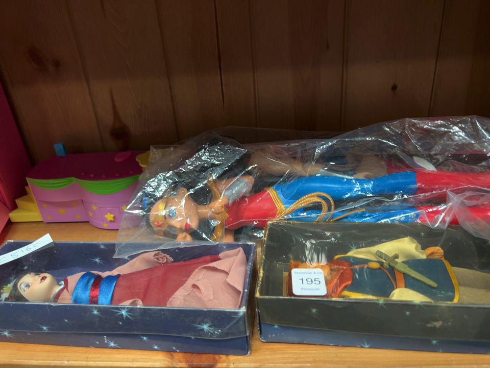 Lot 195: A Collection of Character Dolls and Action Figures including Mattel DC Super Hero Girls and Disney