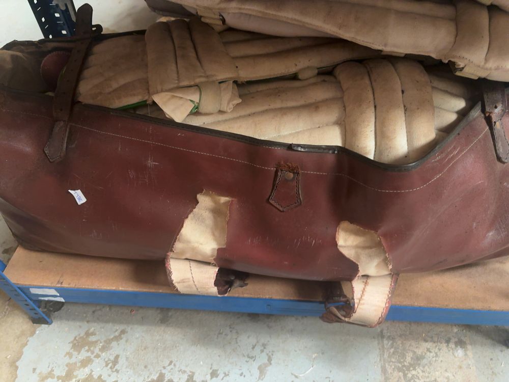 Lot 235: A Pair of Vintage ds Brand Cricket Batting Pads and a Leather Equipment Bag