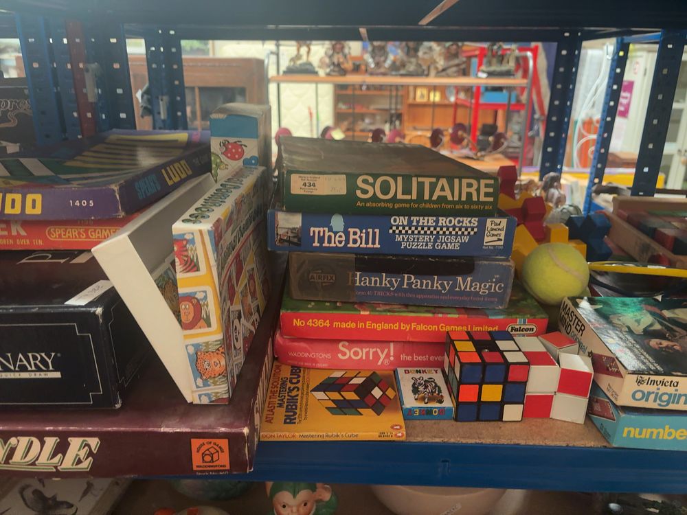 Lot 236: A Collection of Vintage Board Games and Puzzles by Waddingtons, Spear's, and Invicta