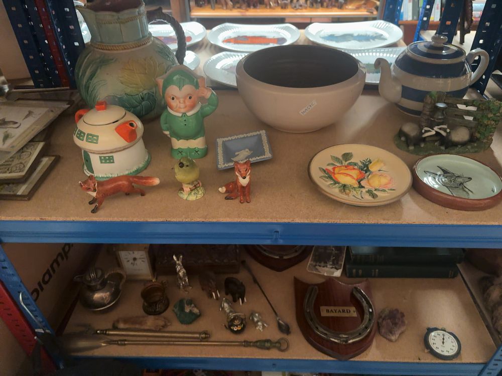 Lot 237: A Collection of British Country Pursuit Themed Ceramics, Metalware, and Books