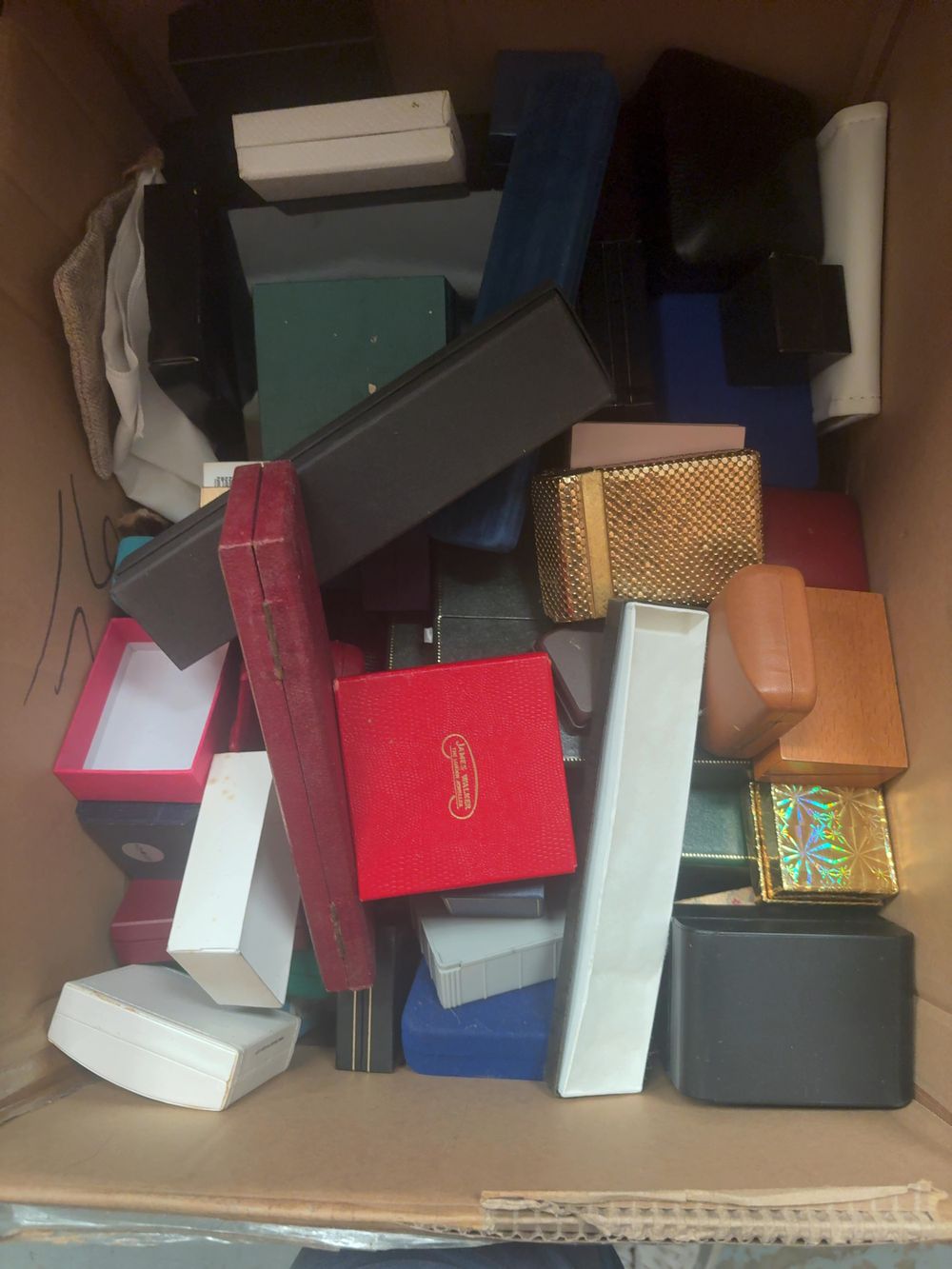 Lot 241: An Assortment of Empty Jewellery Presentation Boxes and Pouches including James Walker, Carrington, and Pandora