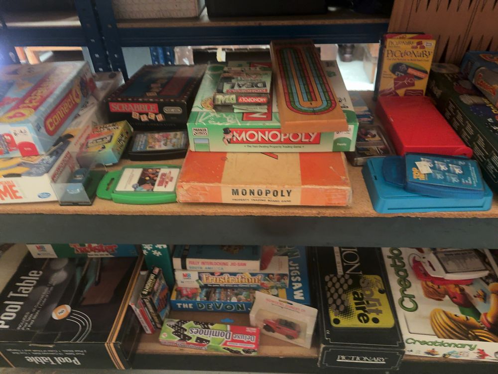 Lot 246: An Assortment of Vintage and Contemporary Board Games, Tabletop Games, and Toys Including Monopoly, MB Games, and LEGO