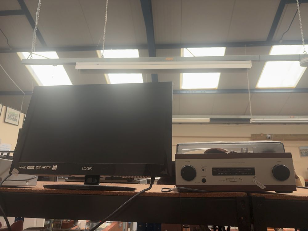 Lot 251: A Trio of Electronics Comprising a Derens 40750 Turntable Radio System, a Panasonic NV-FJ730 VCR, and a Logik LCD Television