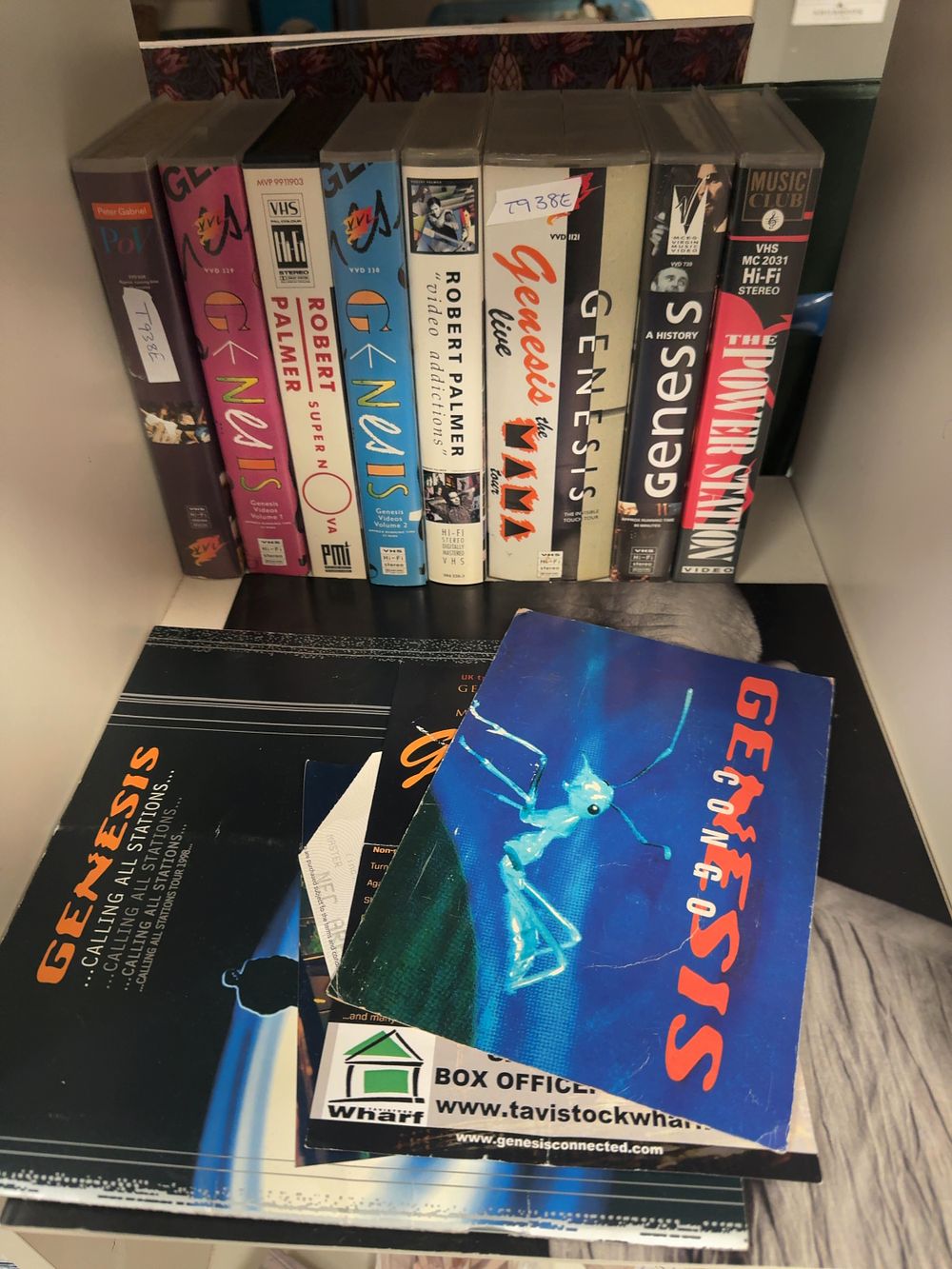 Lot 312: A Collection of Genesis and Related Artist Memorabilia Including VHS Tapes, Tour Programmes and Apparel