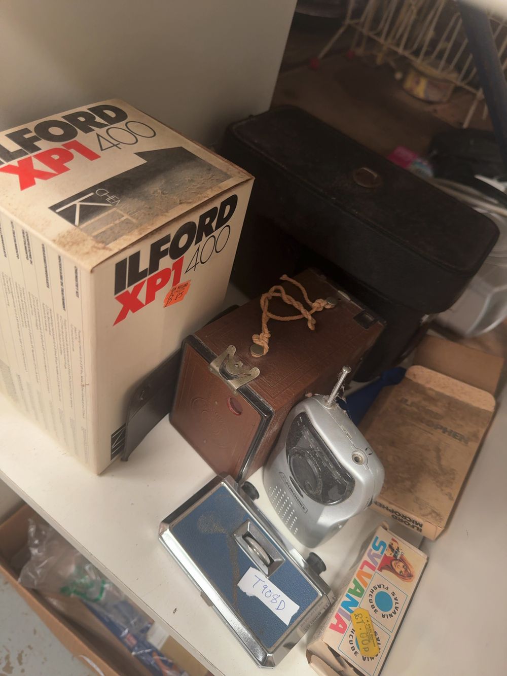 Lot 320: An Assortment of Vintage Photographic Equipment, Ilford Darkroom Consumables, and Portable Radios