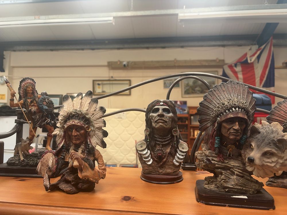 Lot 332: A Collection of five Native American themed decorative figurines and busts