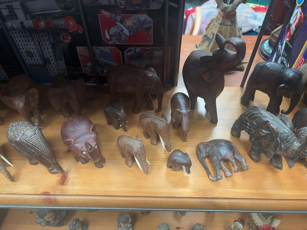Lot 335: An Assortment of Hand-Carved Hardwood Animal Figurines