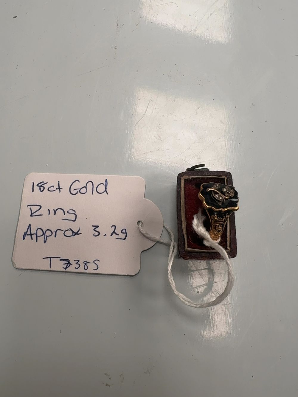 Lot 362: Victorian 18 Carat Gold and Black Enamel Mourning Ring