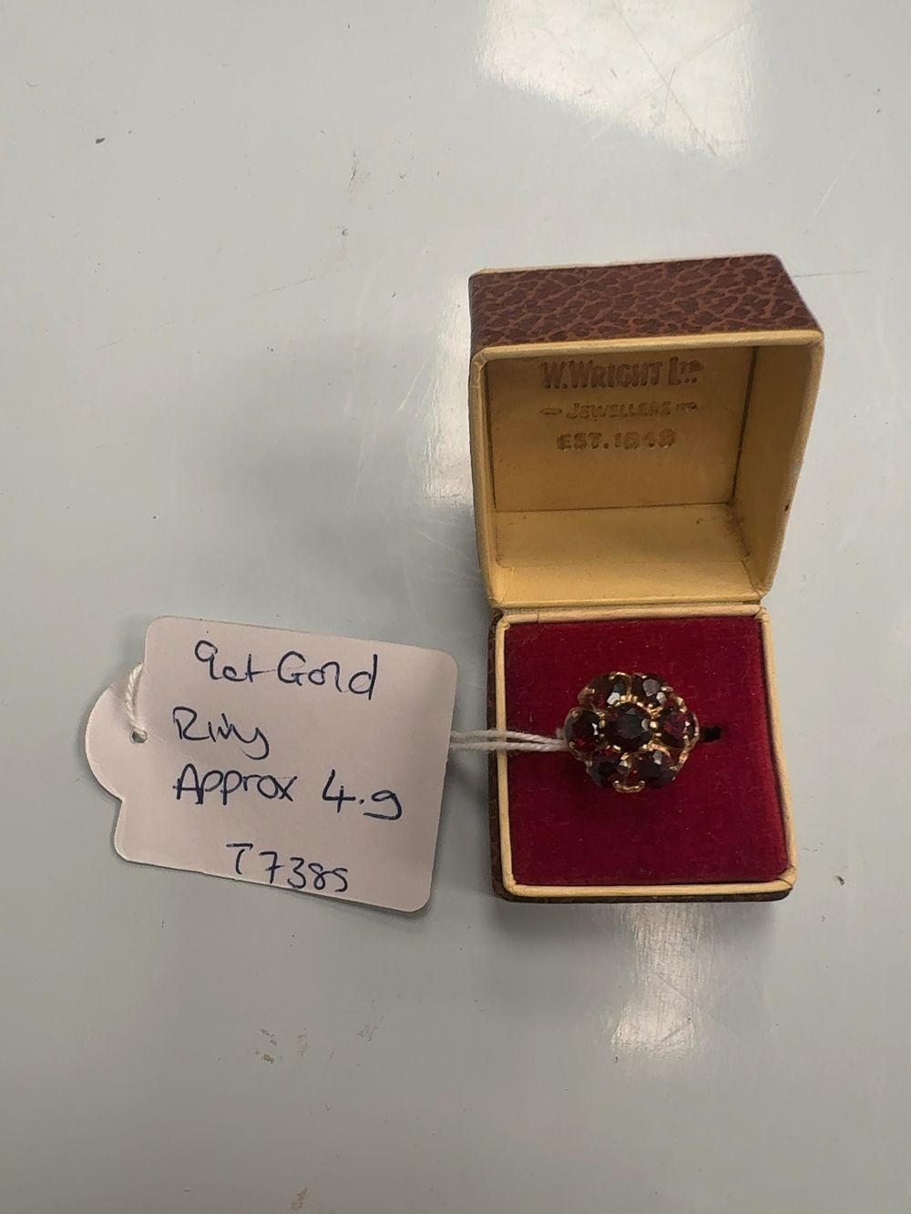 Lot 363: A 9ct Gold Ruby or Garnet Cluster Ring with Presentation Box