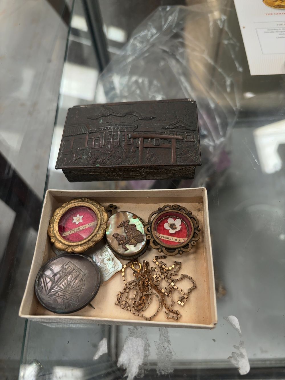 Lot 368: A Collection of Devotional Reliquaries, Jewellery, and an Orientalist Style Metal Box