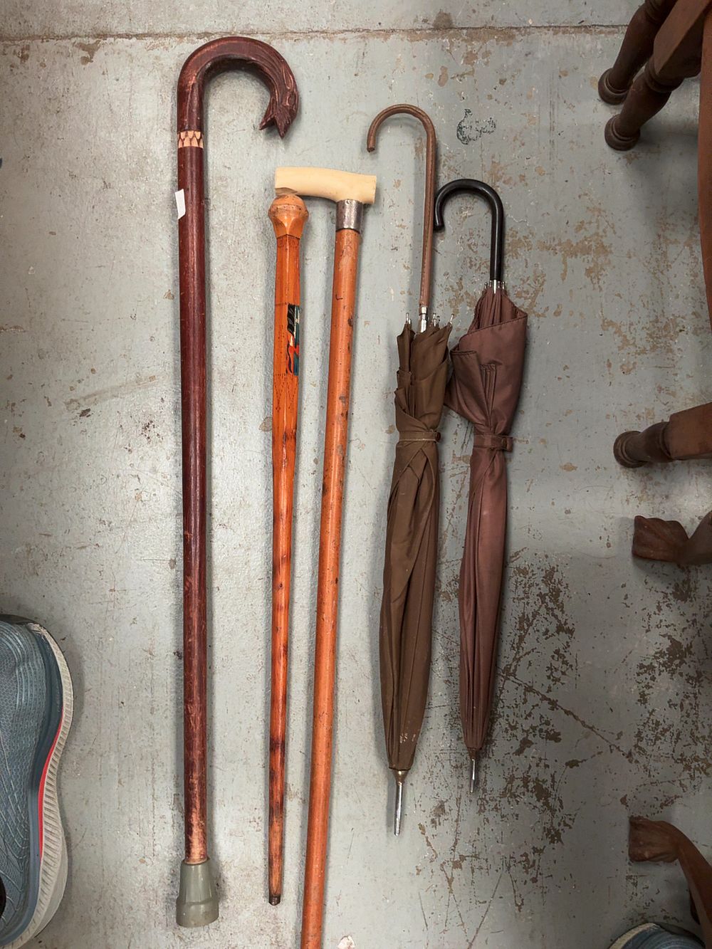 Lot 378: A Group of Vintage Walking Sticks and Umbrellas including a London Sterling Silver Mounted Cane