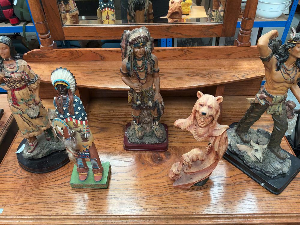 Lot 379: A Collection of Six Native American Themed Polyresin Figurines Including Hinton