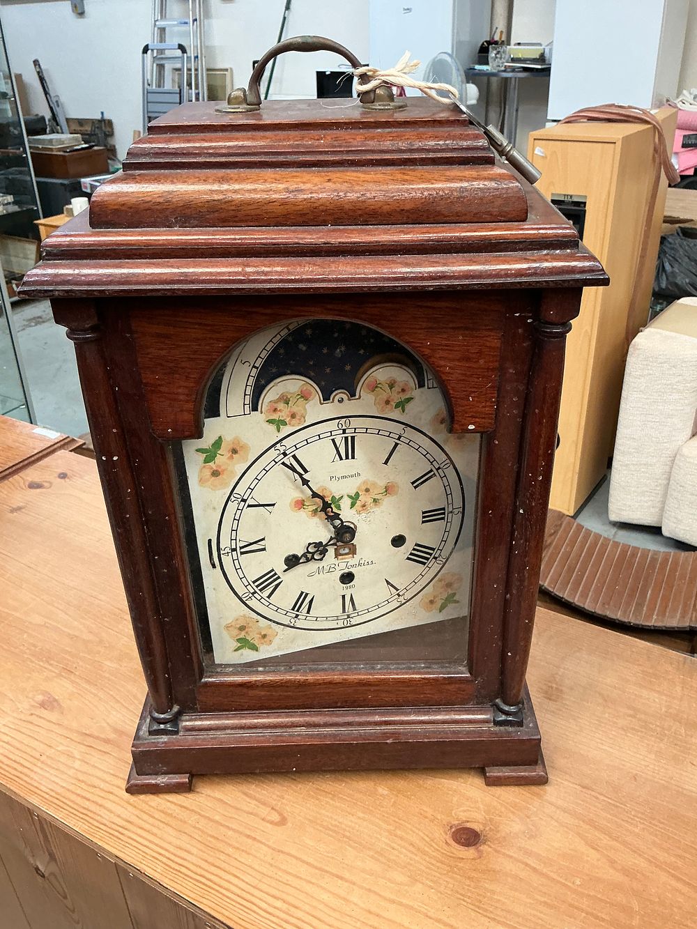 Lot 384: A Late 20th-Century Mahogany-Cased Triple-Train Moon Phase Bracket Clock