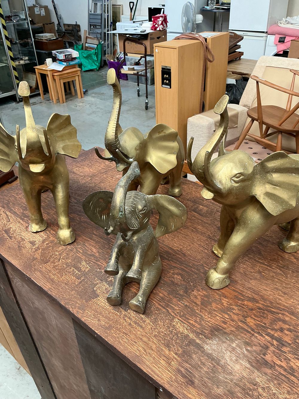 Lot 387: A Group of Four Vintage Cast Brass Elephant Figurines