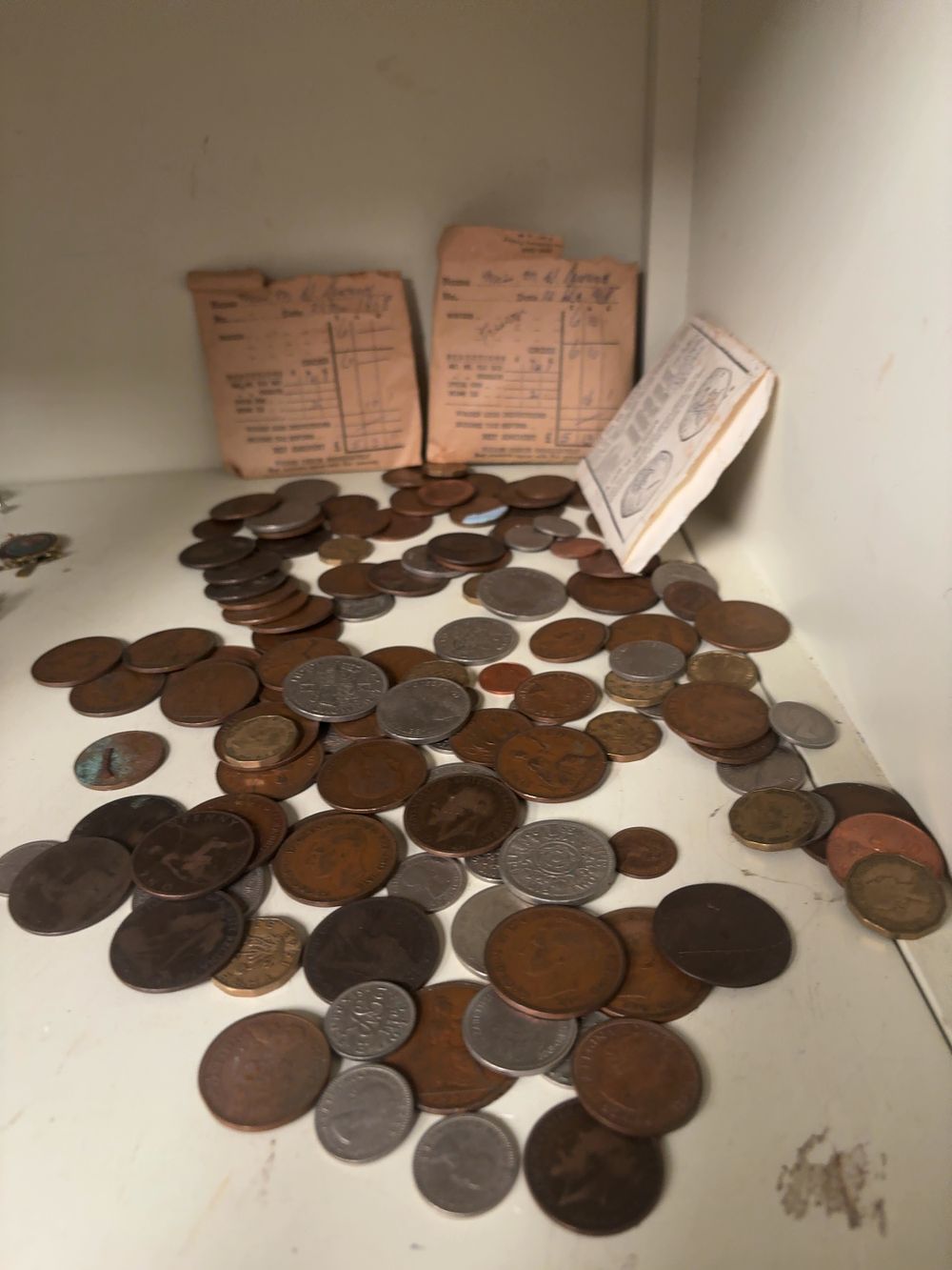 Lot 425: A Collection of UK Pre-Decimal Cupro-Nickel, Nickel-Brass, and Bronze Coinage with Associated 1949 Wage Envelopes