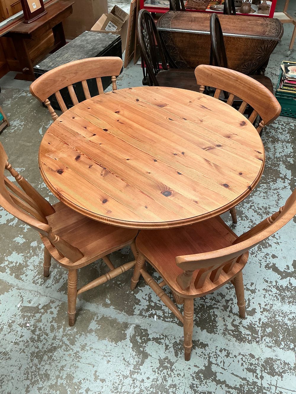 Lot 446: A Pine Table and Four Chairs