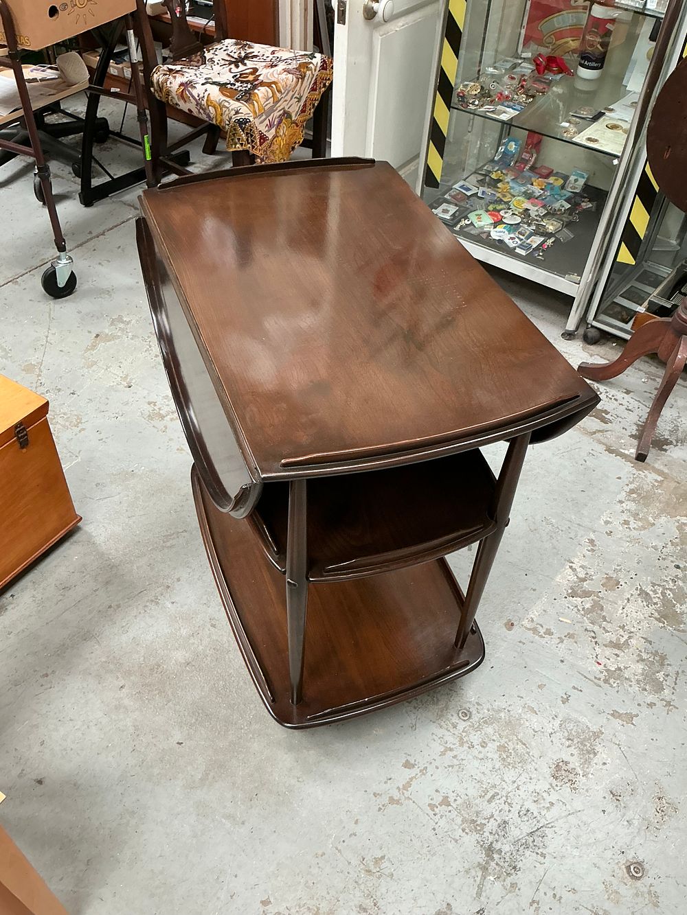 Lot 448: Mid-Century Modern Mahogany Finished Three Tier Drop Leaf Tea Trolley