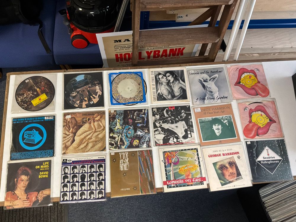 Lot 454: A Collection of Vinyl Records including Van der Graaf Generator Pink Scroll LP, David Bowie Picture Discs, and The Smiths Singles