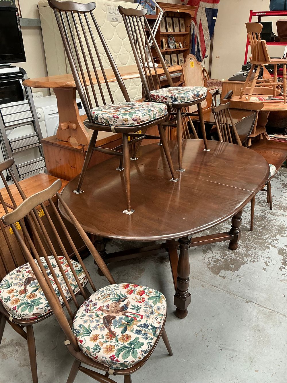 Lot 455: An Ercol Extending Refectory Dining Table and a Set of Six Quaker Chairs