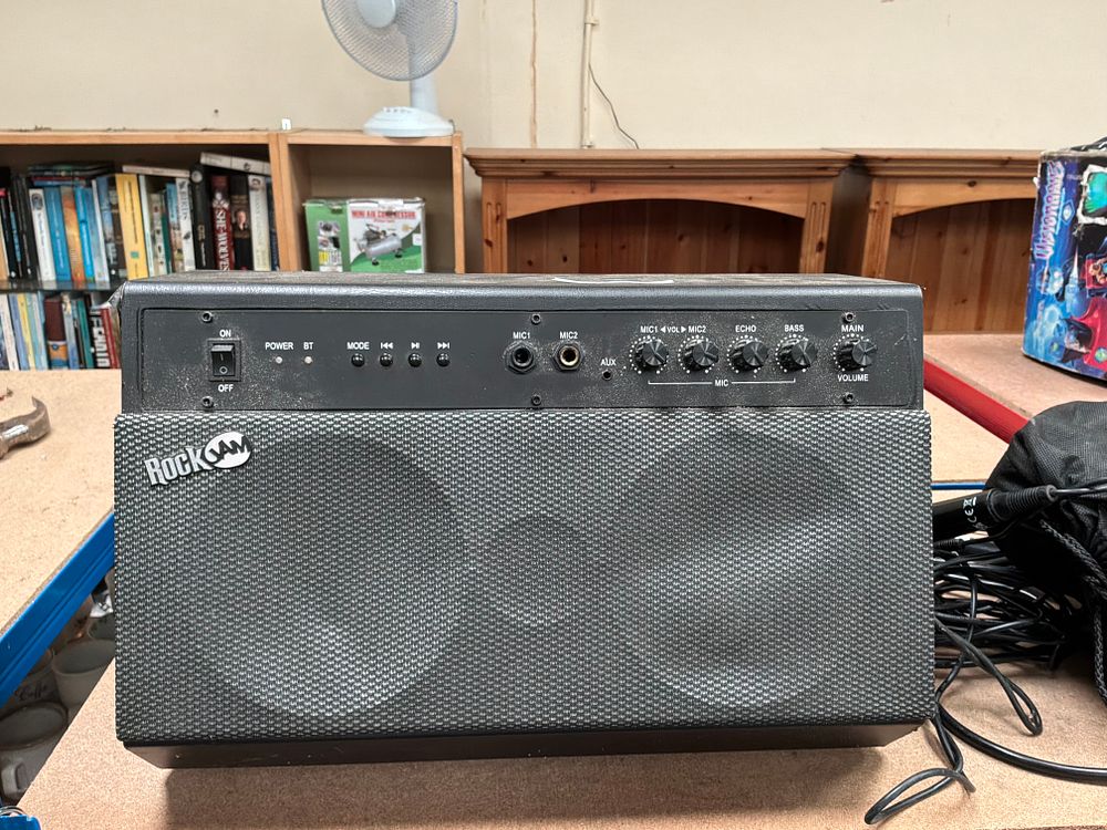 Lot 188: RockJam RJK SK-BK Bluetooth Karaoke Machine with Two Microphones and Power Cleaning Tool
